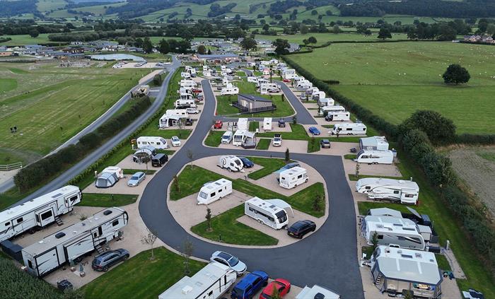 A full touring park, full of families enjoying themselves